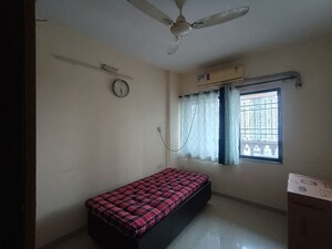 Bedroom in 2 BHK Apartment at Neelkanth Enclave, Kamothe – for Rent