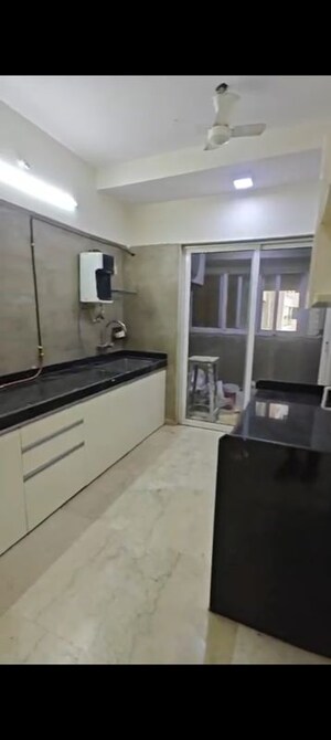 Kitchen in 3 BHK Apartment at Bharat Skyvistas, Andheri West – for Sale