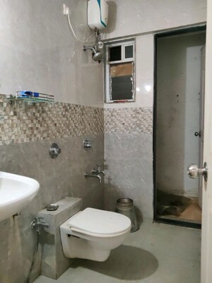 Bathroom in 2 BHK Apartment at Cosmos 27 Gbr, Kasarvadavali – for Rent