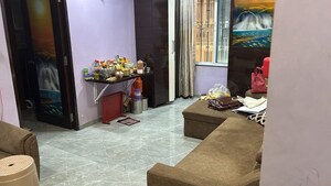 Living Room in 1 BHK Apartment at Dreamax Vega, Andheri East – for Rent