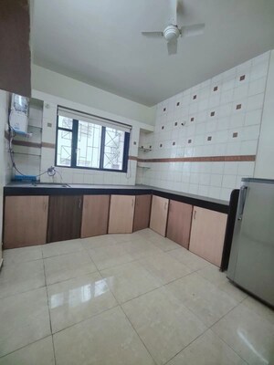 Kitchen in 3 BHK Apartment at Vasudha Sai Simran, Aundh – for Rent