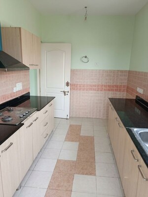 Kitchen in 3.5 BHK Apartment at Ansal Celebrity Meadows, Sushant Golf City – for Rent