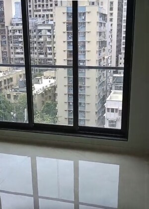 Living Room in 1 BHK Apartment at Ufasa Fortune Star, Byculla – for Sale