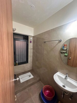 Bathroom in 2 BHK Apartment at Ashapura F Residences, Malad East – for Rent