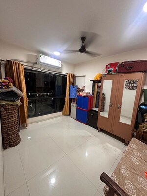 Living Room in 2 BHK Apartment at Ashapura F Residences, Malad East – for Rent