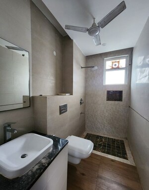 Bathroom in 3 BHK Builder Floor at Paschim Vihar – for Sale