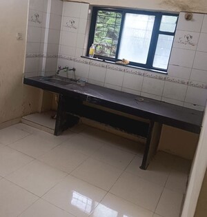 Kitchen in 2 BHK Apartment at Bhoir Estate, Thergaon – for Rent