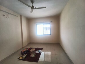Bedroom in 2 BHK Apartment at Bhoir Estate, Thergaon – for Rent
