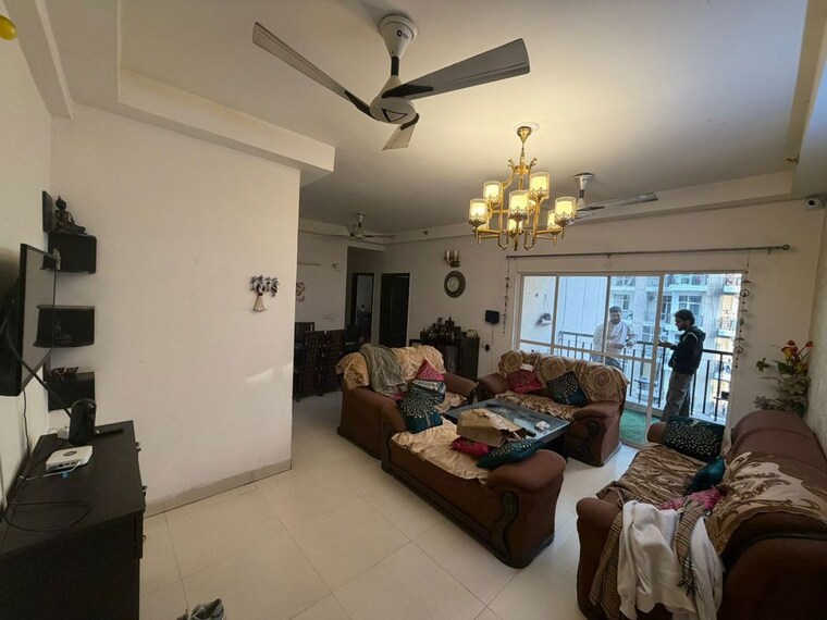 Living Room, amrapali-silicon-city 2.5 Bedroom 1180 Sq.Ft. Apartment In Sector 76 Noida 10627814