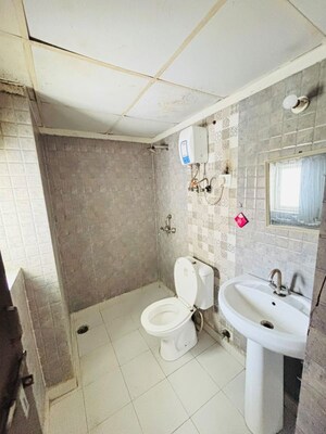Bathroom in 3 BHK Apartment at Amrapali Silicon City, Sector 76 – for Rent
