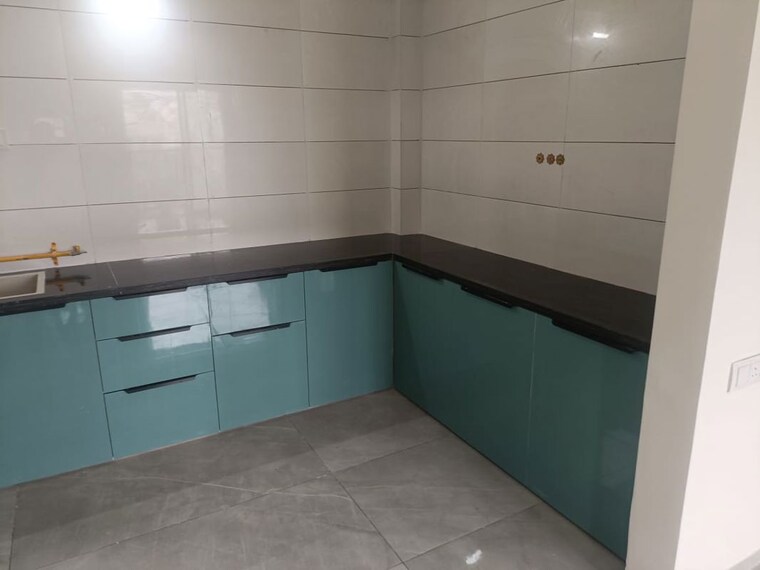 Kitchen, adani-aster-neo 2 Bedroom 850 Sq.Ft. Apartment In Shantigram Ahmedabad 10627821