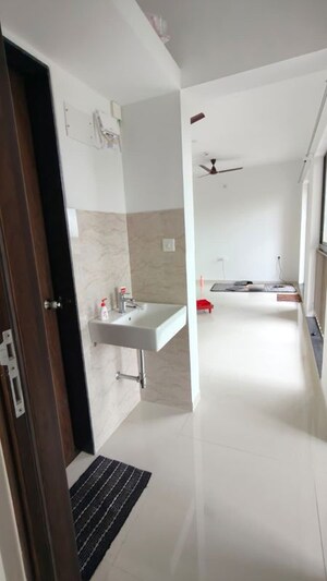 Living Room in 2 BHK Apartment at Shapoorji Pallonji Joyville Hinjewadi, Hinjewadi – for Rent