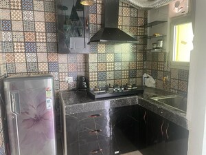 Kitchen in 2 BHK Apartment at Gaur Atulyam, Omicron I Greater Noida – for Rent