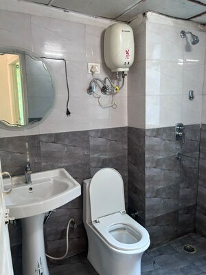 Bathroom in 2 BHK Apartment at Gaur Atulyam, Omicron I Greater Noida – for Rent