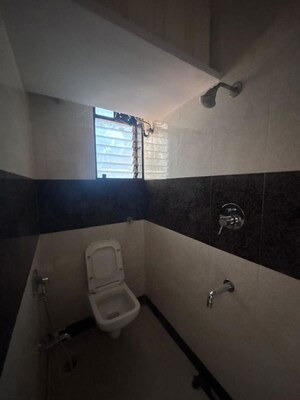 Bathroom in 2 BHK Apartment at Nepolina CHS, Andheri West – for Rent