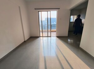Living Room in 2 BHK Apartment at Jalan Aura County Pune, Wagholi – for Rent