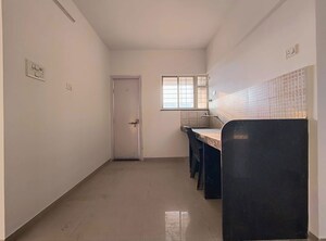Kitchen in 2 BHK Apartment at Jalan Aura County Pune, Wagholi – for Rent