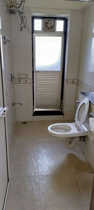 Bathroom in 1 BHK Apartment at Dheeraj Valley, Goregaon East – for Rent