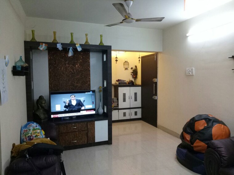 Living Room, ravetkar-arihant-shree 3 Bedroom 1425 Sq.Ft. Apartment In Dahanukar Colony Pune 10628159