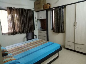 Bedroom in 3 BHK Apartment at Ravetkar Arihant Shree, Dahanukar Colony – for Rent