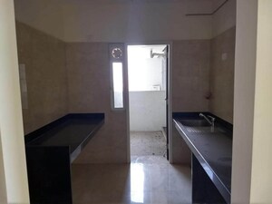 Kitchen in 2 BHK Apartment at Ajmera Arham, Malad West – for Sale