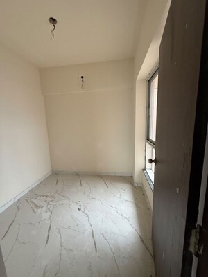 Room in 2.5 BHK Apartment at Anubhav CHS, Mulund West – for Rent