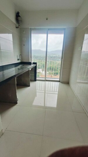 Kitchen in 2 BHK Apartment at Satyam Harmony Kopar Khairane, Kopar Khairane – for Rent