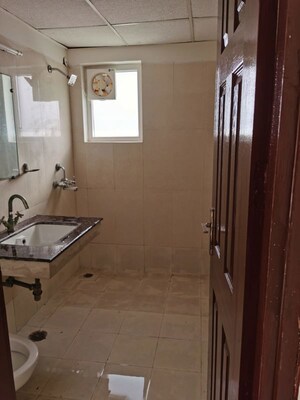Bathroom in 3.5 BHK Apartment at Paramount Floraville, Sector 137 – for Sale