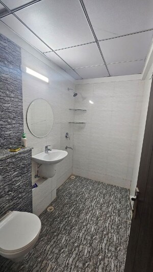 Bathroom in 2 BHK Apartment at Amrapali Silicon City, Sector 76 – for Rent