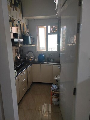 Kitchen in 2 BHK Apartment at Gaur City 2 - 14th Avenue, Sector 16c Greater Noida – for Rent