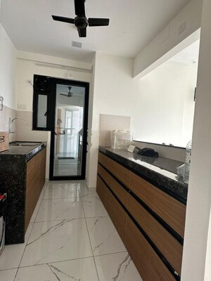 Kitchen in 2 BHK Apartment at Mahindra Nestalgia, Pimpri – for Rent