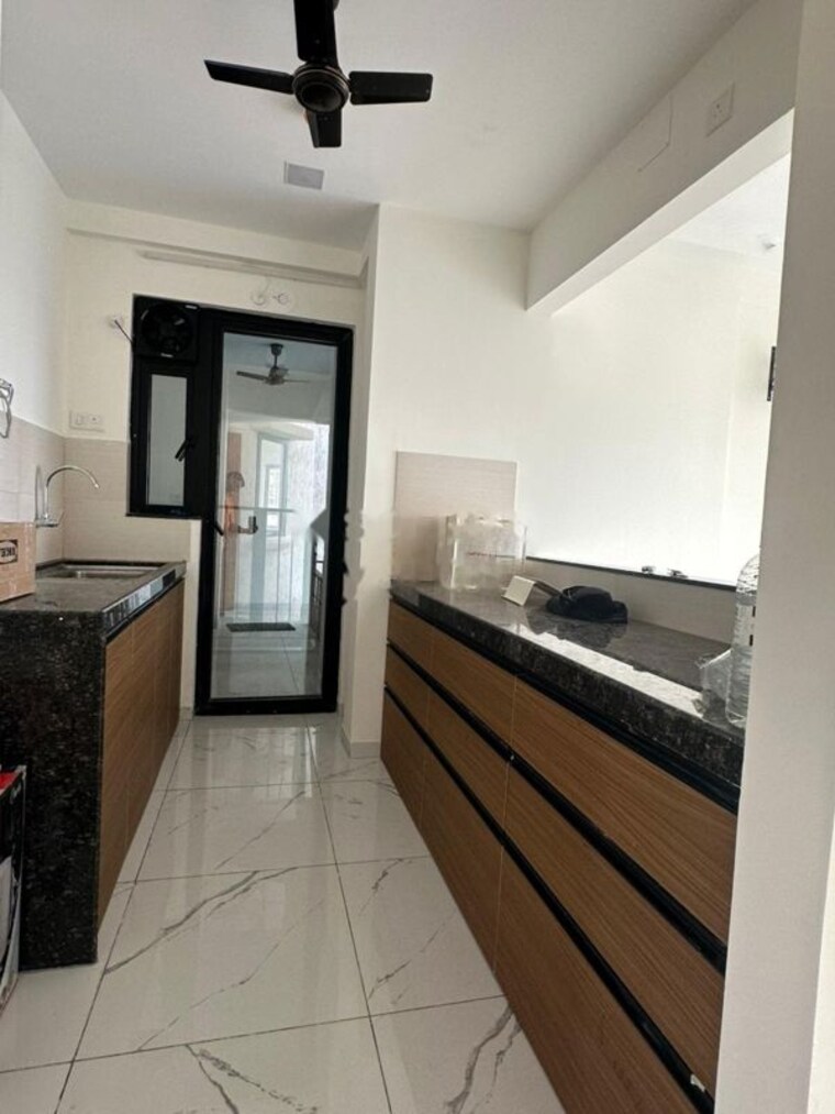 Kitchen, mahindra-nestalgia 2 Bedroom 1100 Sq.Ft. Apartment In Pimpri Pune 10628429