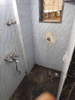 Bathroom in 1 RK Apartment at Omkar Darshan CHS, Andheri East – for Rent