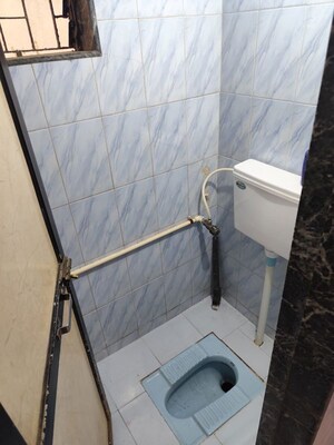 Bathroom in 1 RK Apartment at Omkar Darshan CHS, Andheri East – for Rent