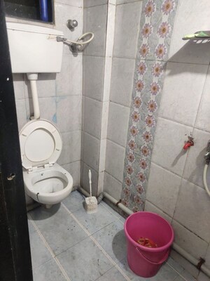 Bathroom in 1 BHK Apartment at Omkar Darshan CHS, Andheri East – for Rent