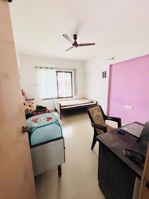 Living Room in 2 BHK Apartment at Windwards CHS, Wakad – for Rent