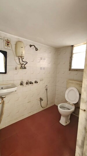 Bathroom in 3 BHK Apartment at Doordarshan CHS, Goregaon East – for Rent