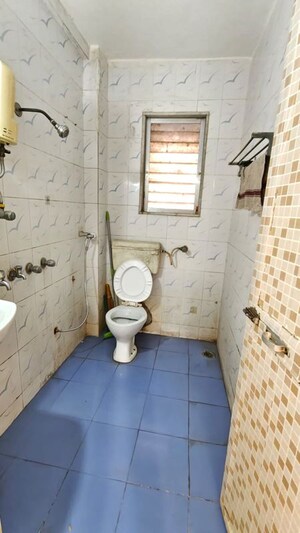 Bathroom in 3 BHK Apartment at Doordarshan CHS, Goregaon East – for Rent