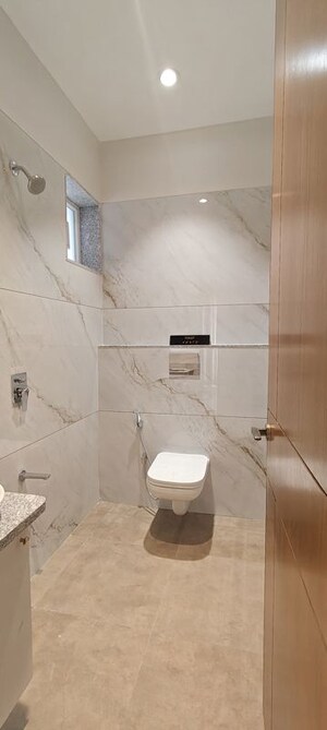 Bathroom in 4 BHK Apartment at Dev Nagar – for Sale