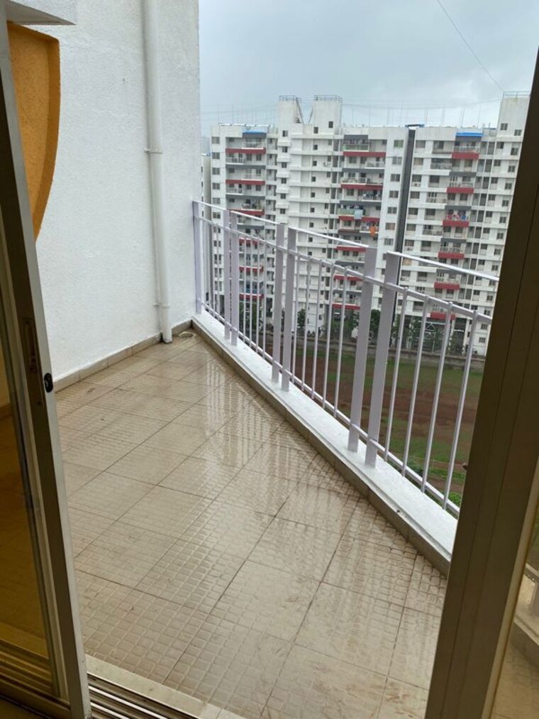 Balcony, palash-fgh 2 Bedroom 850 Sq.Ft. Apartment In Wakad Pune 10628509