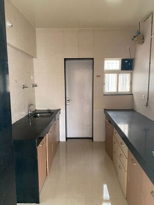 Kitchen in 2 BHK Apartment at Palash FGH, Wakad – for Rent