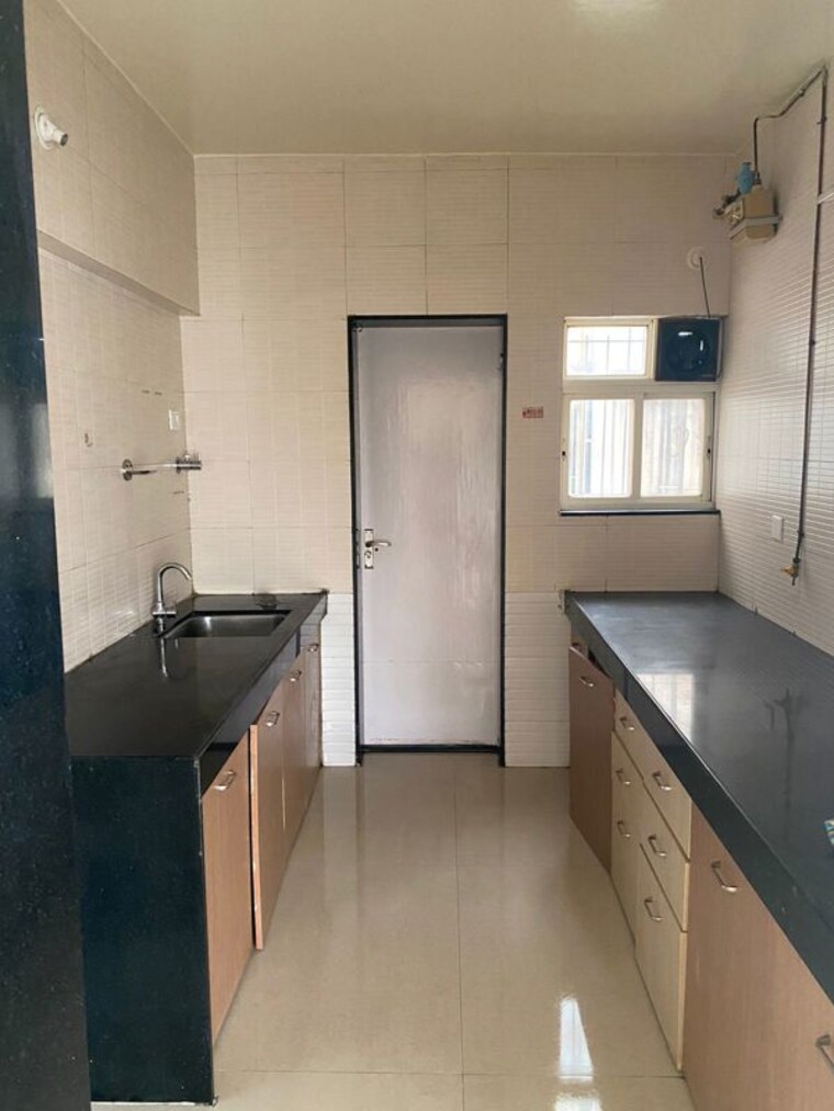 Kitchen, palash-fgh 2 Bedroom 850 Sq.Ft. Apartment In Wakad Pune 10628509