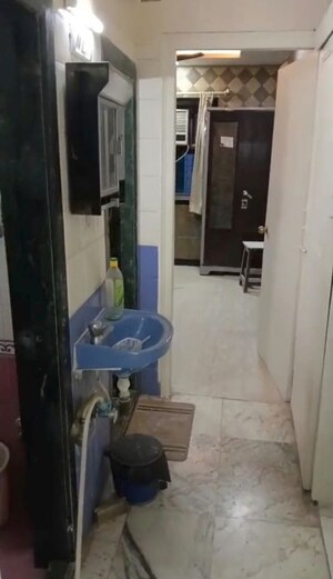 Bathroom in 1 BHK Apartment at Anand Prakash Satyam CHS, Andheri East – for Rent