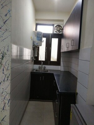 Kitchen in Studio Builder Floor at Sushant Lok I – for Rent