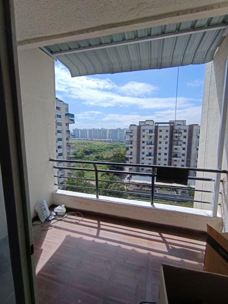Balcony, jalan-aura-county-pune 2 Bedroom 1000 Sq.Ft. Apartment In Wagholi Pune 10628614