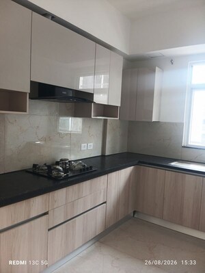 Kitchen in 2.5 BHK Apartment at Smart World Orchard, Sector 61 – for Rent