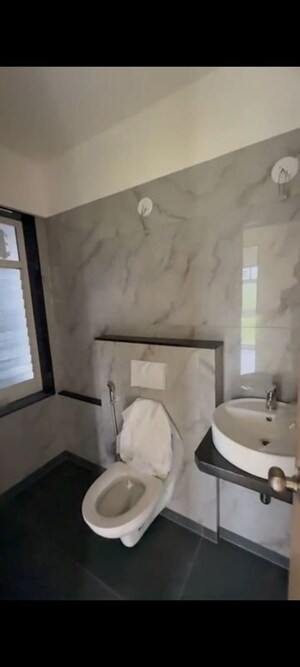 Bathroom in 1 BHK Apartment at MICL Aaradhya Parkwood, Mira Road – for Rent