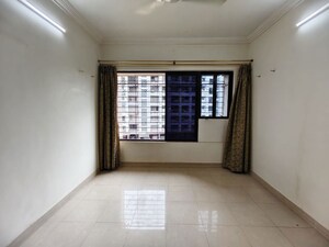 Room in 2 BHK Apartment at Rajesh Raj Sarovar, Dahisar West – for Sale