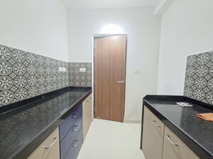 Kitchen in 1 BHK Apartment at Lodha Amara, Kolshet Road – for Rent
