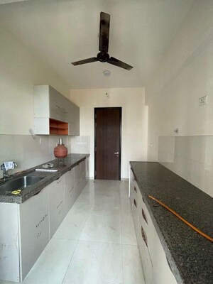Kitchen in 2 BHK Apartment at Arjun CHS Vasant Vihar, Vasant Vihar – for Rent